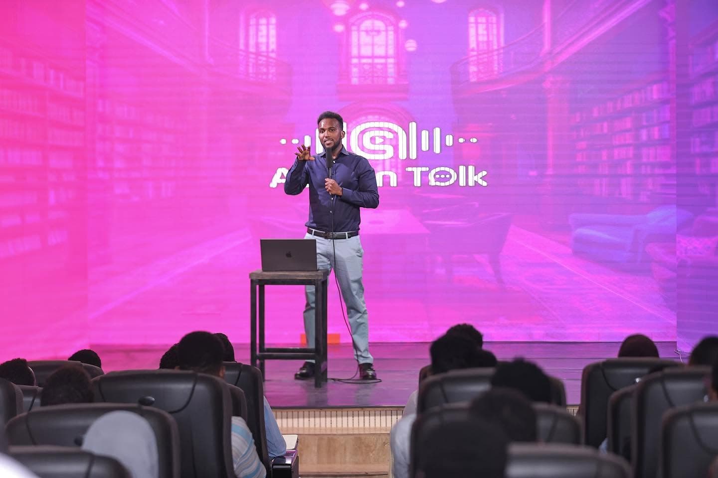 Speaker on stage at Astaan Talk