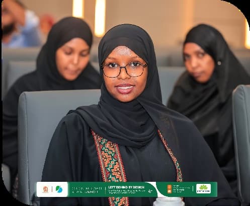 A young creator wearing glasses attends the report launch