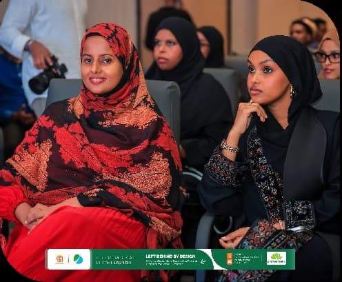 Two women in the audience during the panel discussion